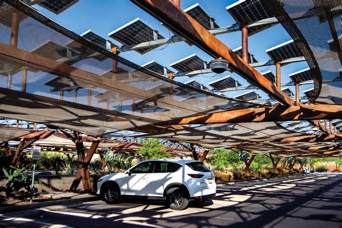 Solar panels over parking lots can help fight the urban heat island effect