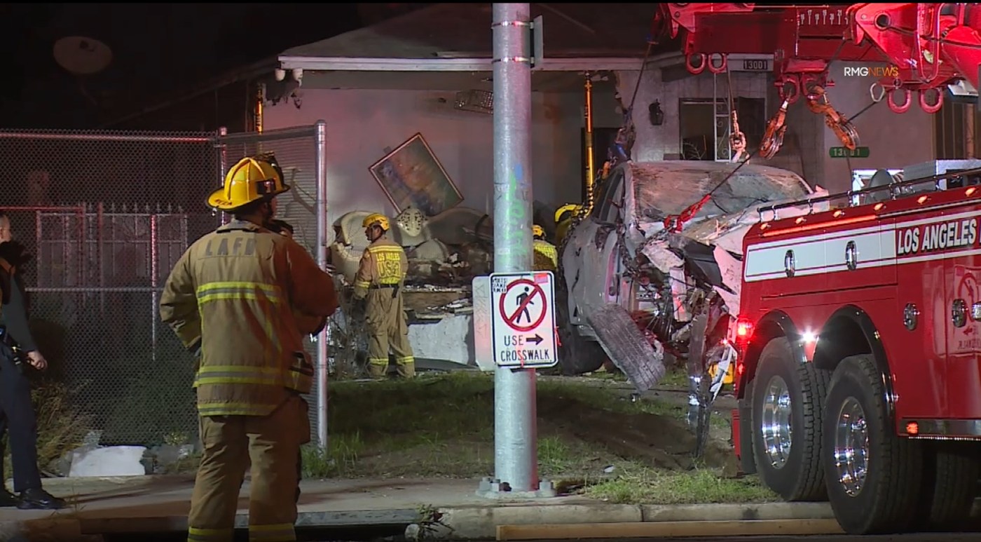 Tesla crashes into living room of a Pacoima home, injuring 2