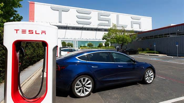 Tesla stock plummets as EV giant reports decline in annual deliveries for the first time