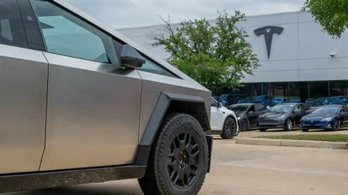 Tesla stock slips after report EV maker is halting Cybertruck and Model Y production