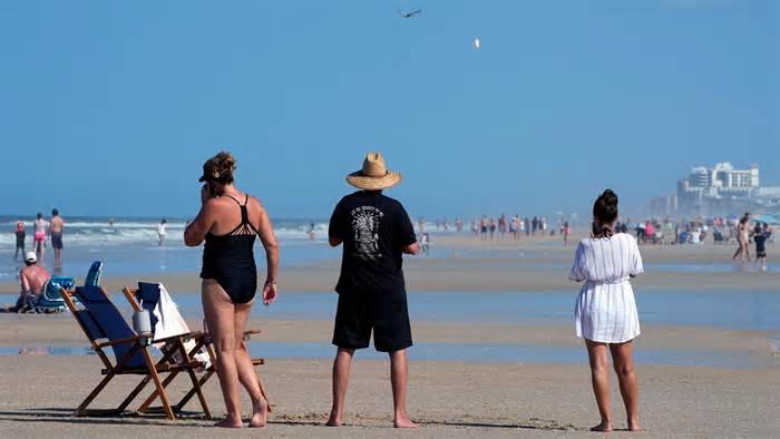 SpaceX double launch lights up Florida sky, but most Volusia beachgoers don't notice