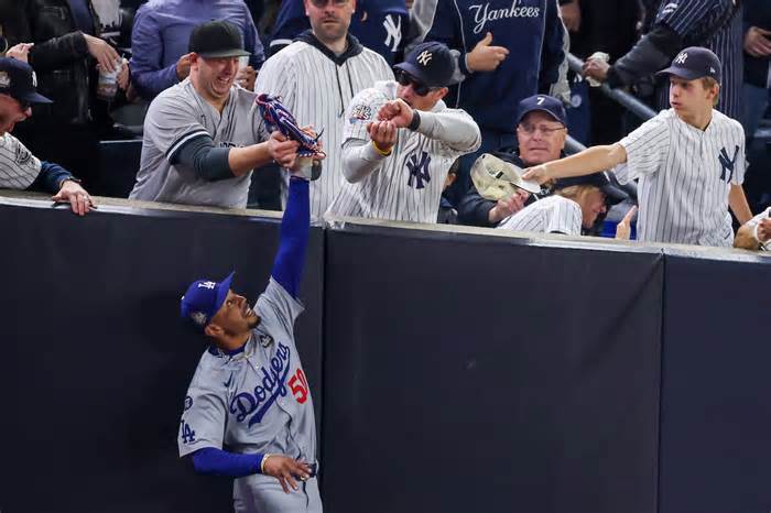 Yankee Stadium fan ejected for prying ball out of Mookie Betts' glove at World Series