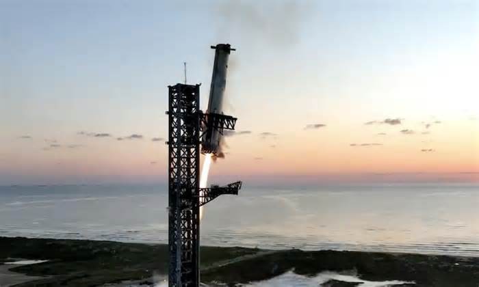 SpaceX Catches Returning Starship Booster With Launch Gantry