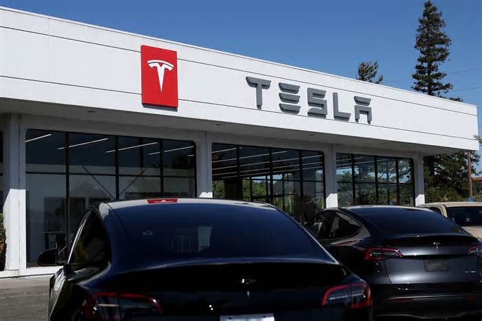 Tesla Stock Pops as Earnings Top Estimates, With Lower-Cost Vehicle Plans 'on Track'