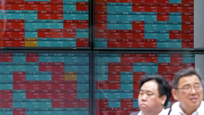 Stock market today: Asian shares mixed after AI hopes nudge Wall St to records. BOJ stands pat