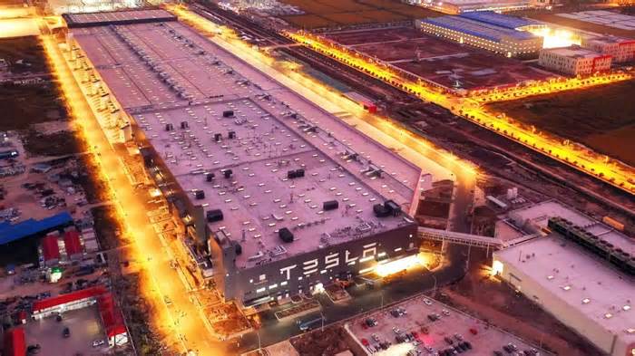 Tesla brings its gigafactory to China, with an unexpected twist: Thousands of people go to check it out