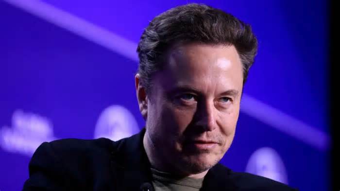 Musk hits back after being shunned from UK summit