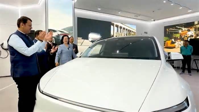 Fadnavis sits inside Tesla Model Y, inaugurates EV giant's first showroom in Mumbai | Watch