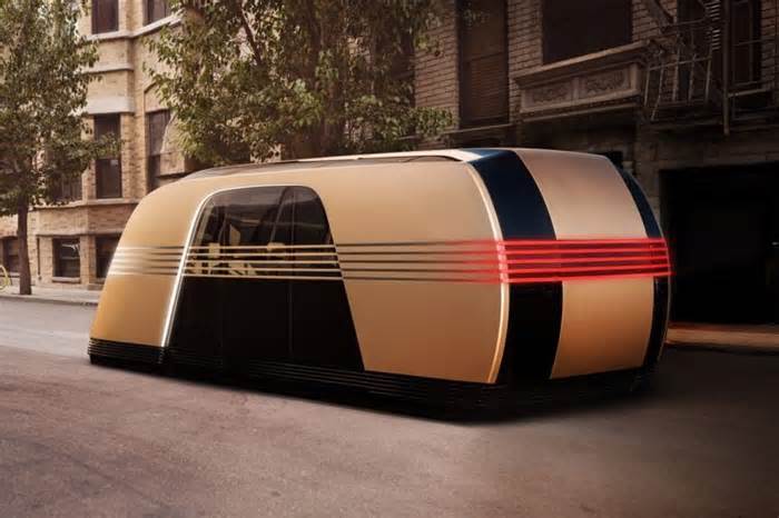 Elon Musk Says Robovan's Angular Design Inspired By Art Deco Trains, 'Unusually Low' Ground Clearance Enabled By Automatic Load-Leveling Suspension