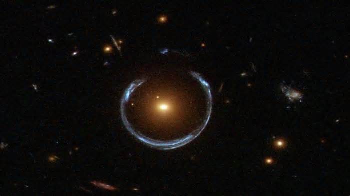 Monstrous black hole 36 billion times heavier than Sun twists light in deep space
