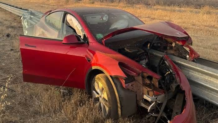 Tesla veers off Highway 5 crashing into metal guardrail