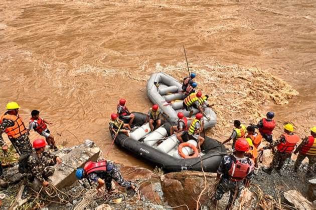 Search operation resumes in Nepal for two passenger buses swept by landslide