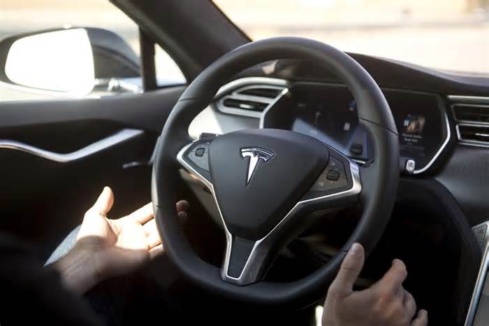 Tesla to Unveil AI-Powered Robotaxi, Faces Scrutiny Over Self-Driving Safety Claims