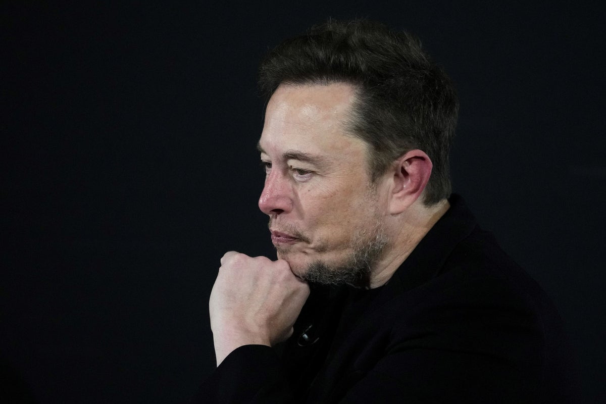 Elon Musk makes surprise Davos appearance in striking reversal