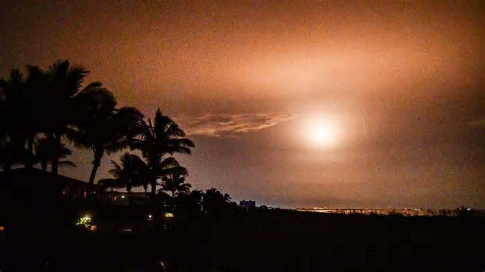 Rise and shine: SpaceX Falcon 9 glows through Space Coast clouds | Photo of the Week