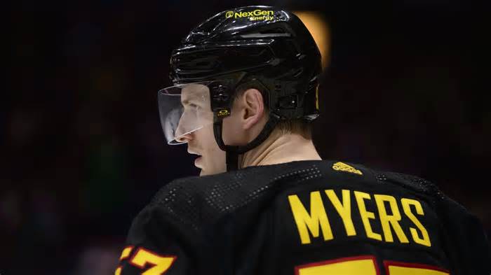 Canucks’ Miller gives ‘A’ away for Myers’ 1,000th game celebration