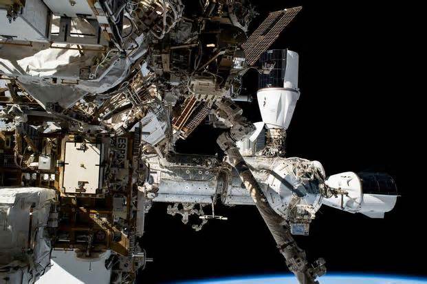 NASA Chooses SpaceX Vehicle to Deorbit ISS as Crews Take Cover from Near Collision