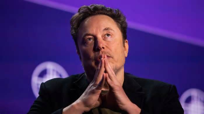 WhatsApp boss in online spat with Elon Musk