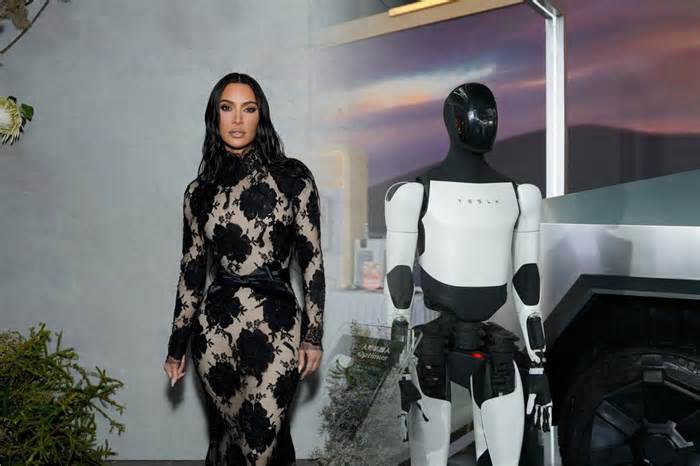 Kim Kardashian has befriended Optimus, the Tesla bot