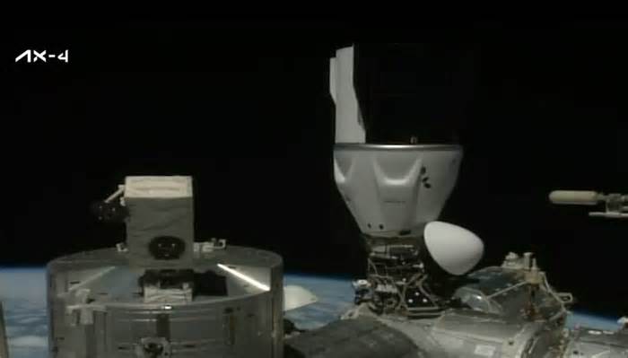 SpaceX Crew Dragon with 4 Axiom Space astronauts docks with space station