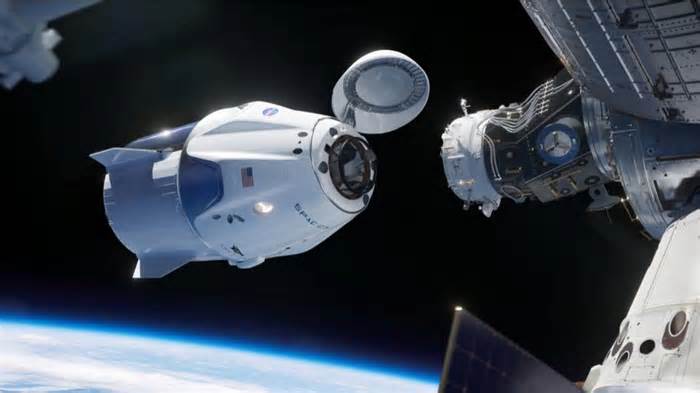 SpaceX Dragon Capsule Docks At ISS To Retrieve Astronauts Stranded By Boeing Capsule Fault