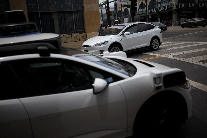 Tesla’s Musk expects widespread use in US of cars without human monitors this year