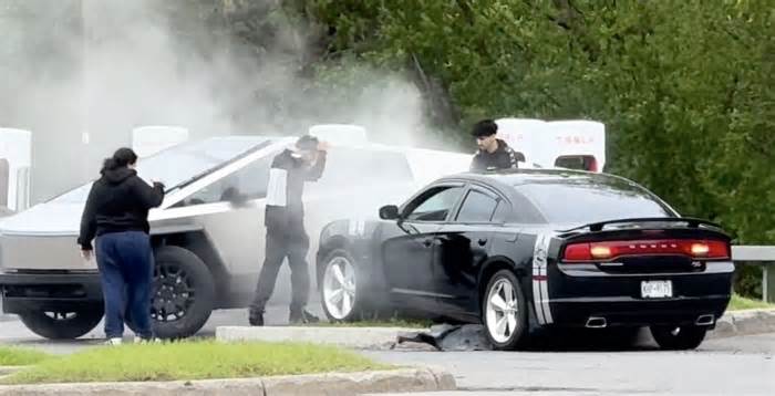 Tesla Cybertruck Almost Gets Rammed Into While Charging As Dodge Charger Stops Inches Away