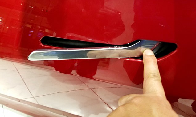 China bans hidden 'pop-out' car door handles popularised by Musk's Tesla as part of new safety standards