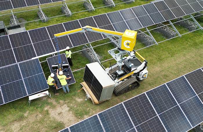 New semi-autonomous vehicle helps to lift solar panels in the field