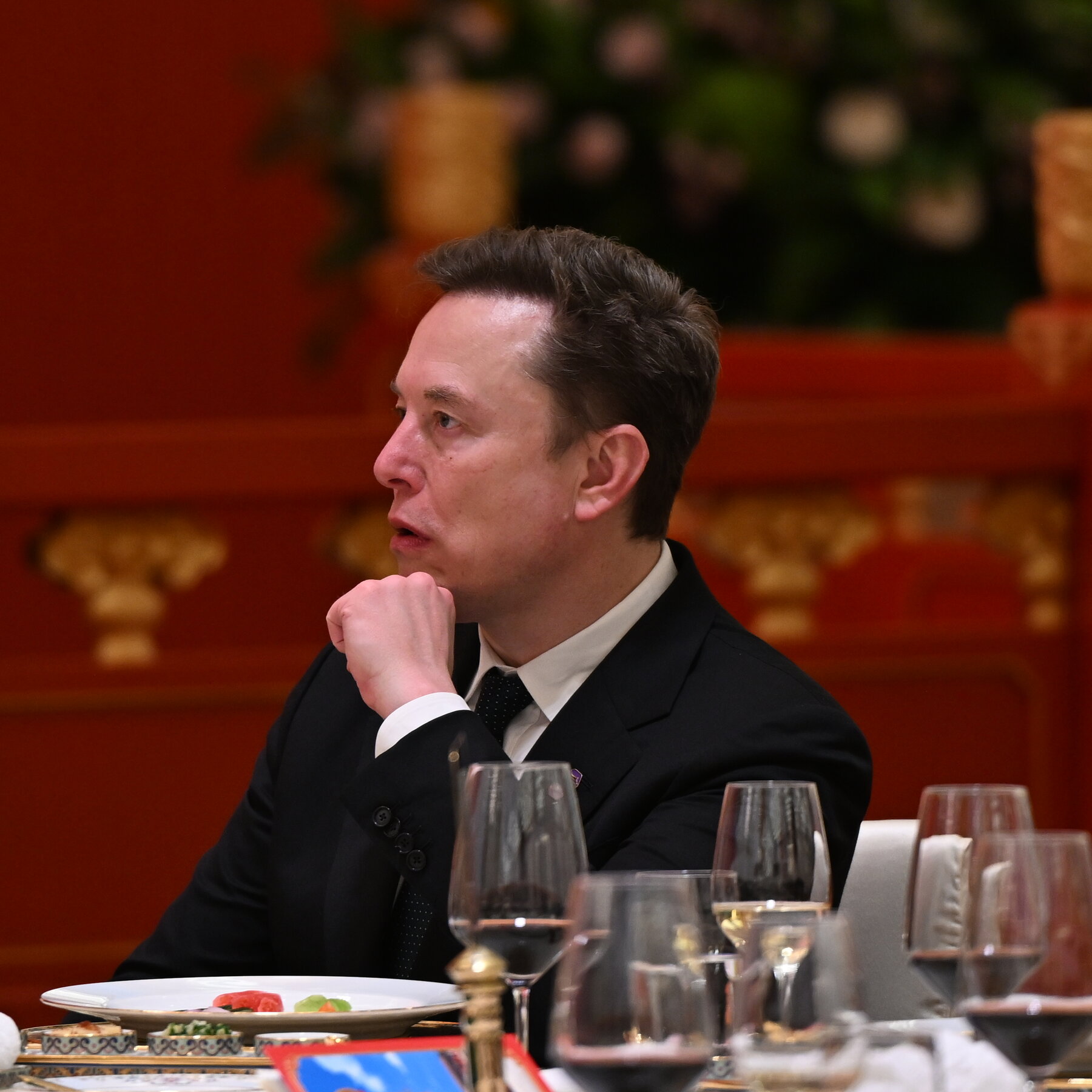 Elon Musk and Other CEOs on Trump’s Trip to China Sought Relief